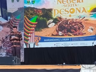 Pembukaan Lomba Marandang Lokan pada Festival Negeri Sejuta Pesona 2026 di Pantai Carocok Painan.