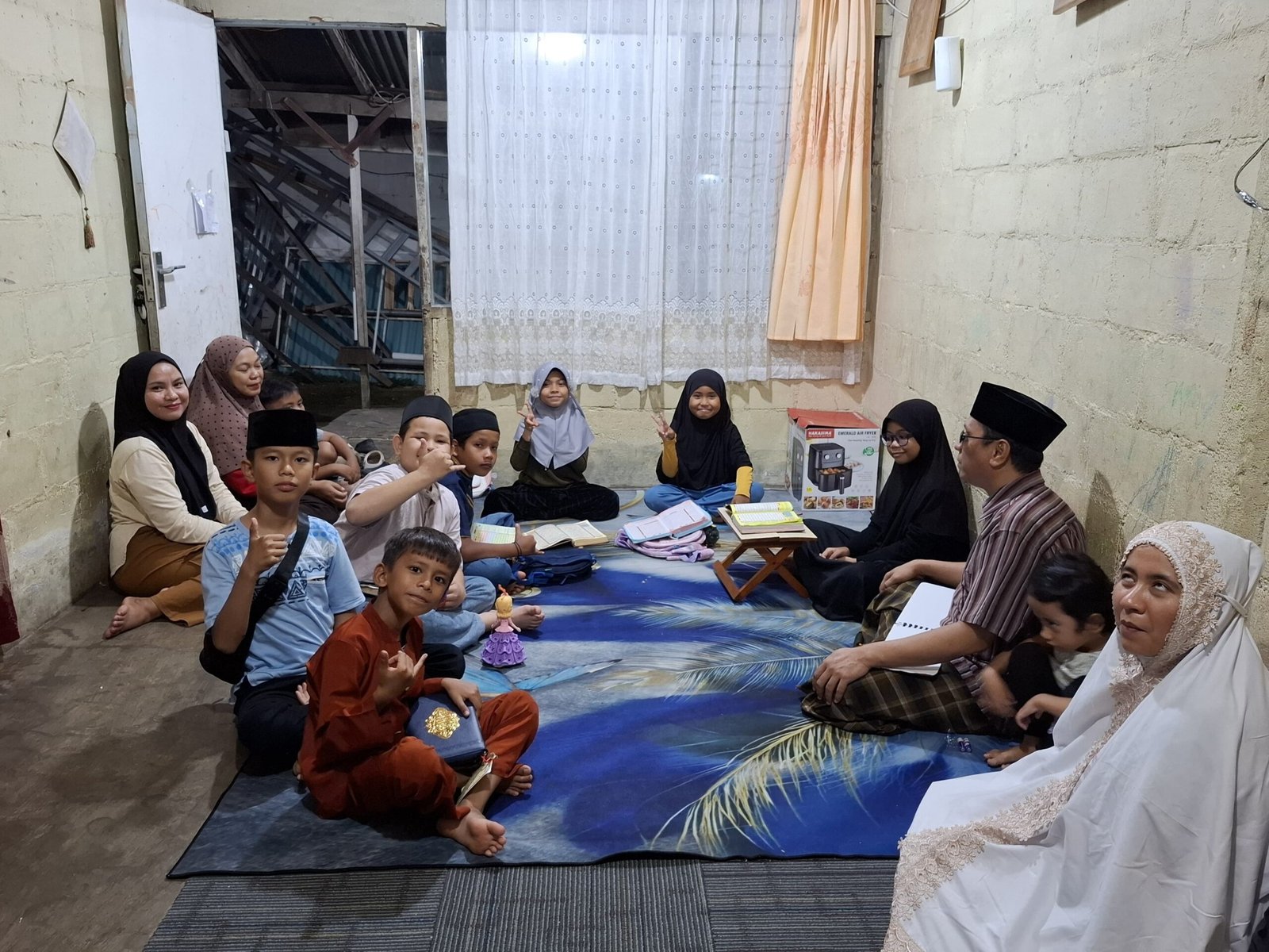 Dari Rumah Sederhana di Painan, Suherman dan Elza Menyalakan Cahaya Al-Qur’an